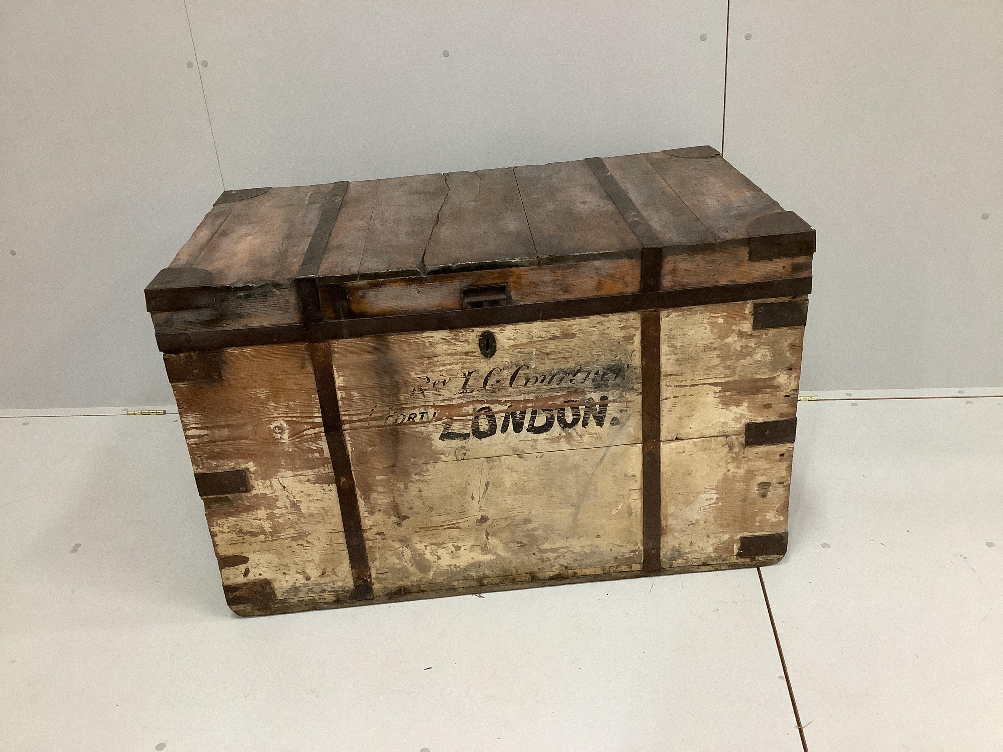 A vintage iron bound pine trunk width 107cm, depth 62cm, height 68cm.